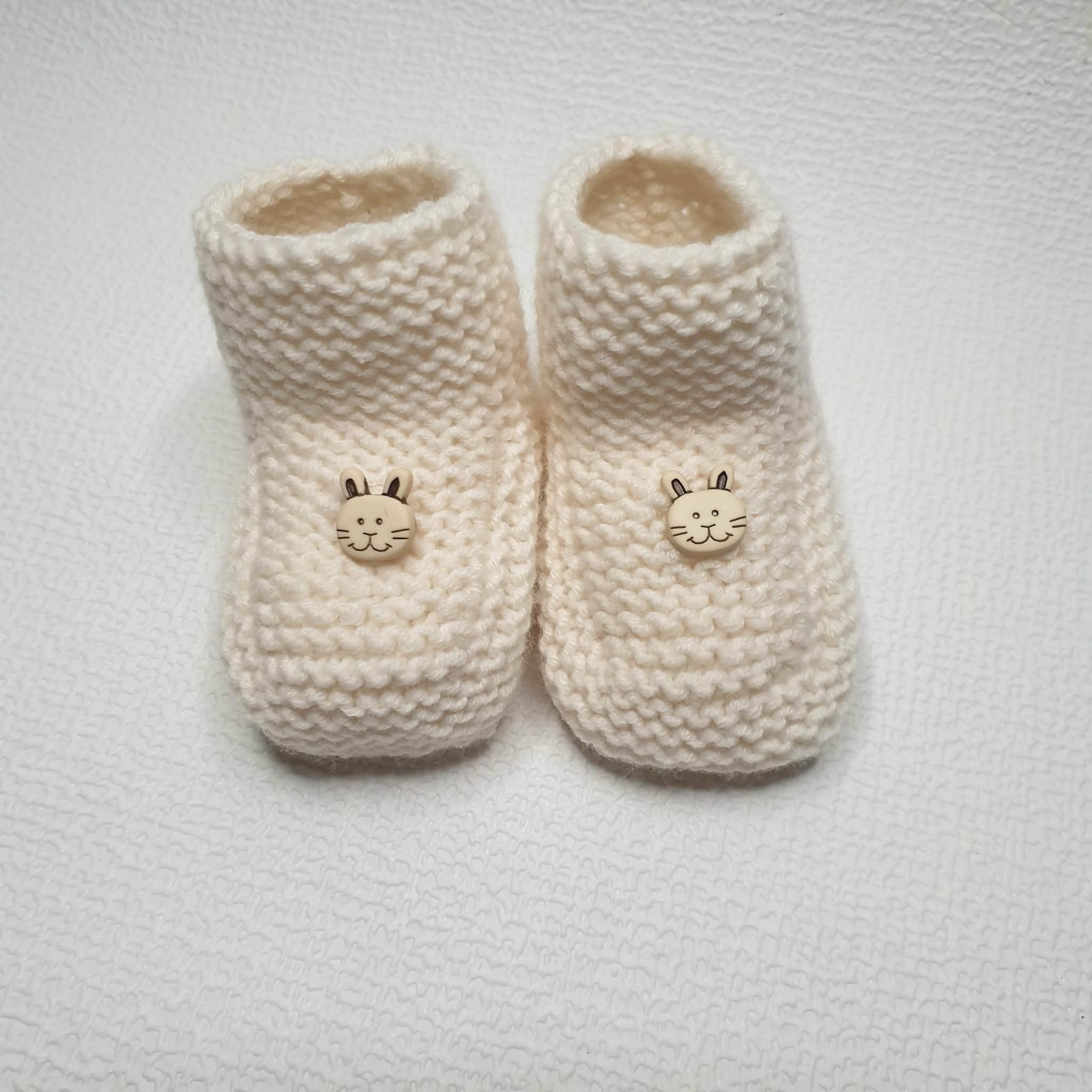 Chaussons bébé écrus